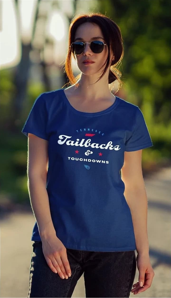 Concept mockup: a woman in a royal blue Tailbacks & Touchdowns tee